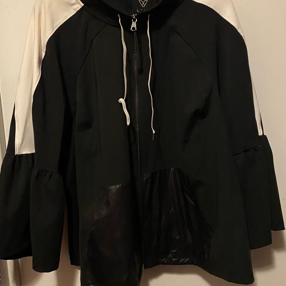 Cropped bell sleeve athletic jacket. Size 26 with drawstring neck area